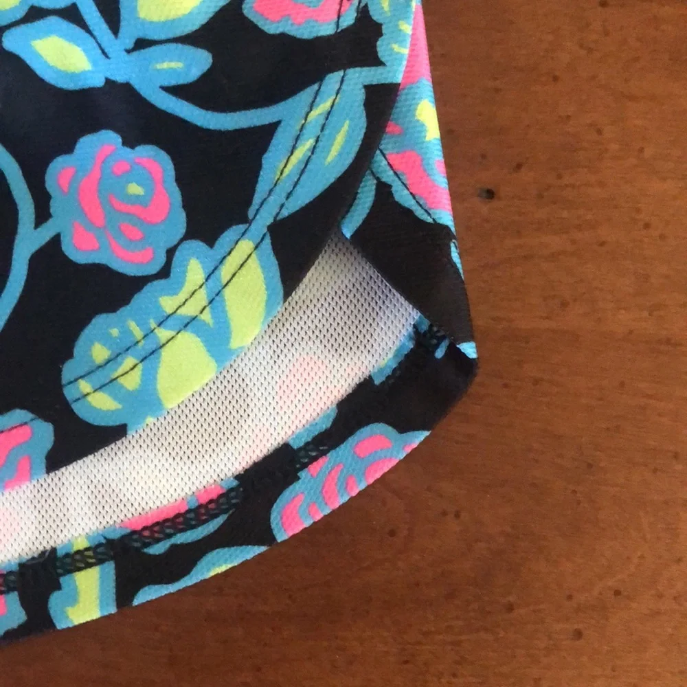 YXL Girl’s Under Armour Floral Hawaiian loose fit drawstring shorts